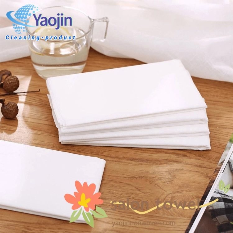 China Custom White Disposable Beauty Salon Towels Biodegradable Cleaning Face Facial Hand Hair Foot Nail Body Pedicure Towel Supplier