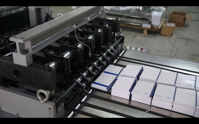 Three Knife Book Trimmer with Automatic Blade Adjustment