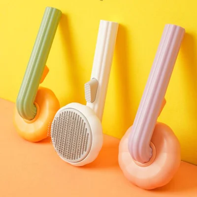 La autolimpieza Slicker cepillos para Perros Gatos Pet Grooming Brush Tool elimina suavemente la capa de imprimación calabaza mascota peine