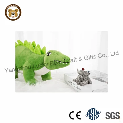  Mayorista de juguetes de felpa suave adorable peluche de dinosaurios a los niños varones de títeres