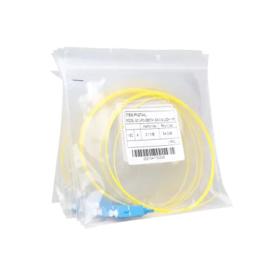 0,9 mm G657A1 de fibra óptica de Sm Sx Pigtail 1M Sc Pigtail fibra monomodo Sc/UPC en forma de espiral