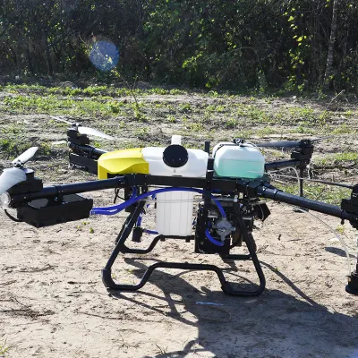 Larga duración de vuelo 16 litros Oil-Electric Hybrid Sprayer Drone gasolina Energía Agricultura uso pulverización Pesiticidas Drona híbrida agrícola con centrífuga Boquillas