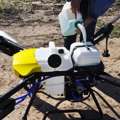 Larga duración de vuelo 16 litros Oil-Electric Hybrid Sprayer Drone gasolina Energía Agricultura uso pulverización Pesiticidas Drona híbrida agrícola con centrífuga Boquillas