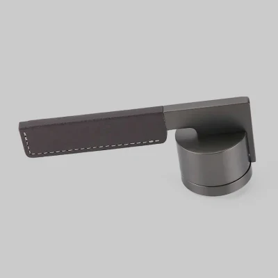 Última cerradura de puerta de lujo de aleación de zinc. Manijas de puerta de cuero modernas para puertas interiores.
