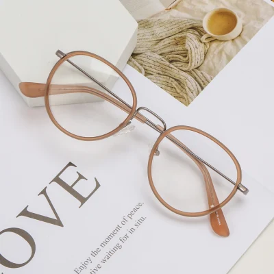  Monturas ópticas redondas de diseño clásico hechas a mano con acetato y metal.