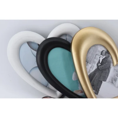 Cornice fotografica a forma di cuore fatta di iniezione