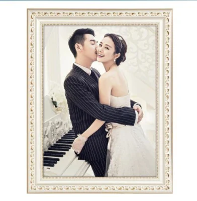 Cornici fotografiche di legno a forma di libro per matrimoni