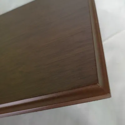 Placca in legno con finitura opaca in noce con bordo a covata