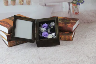 Cornice fotografica conservata con fiori conservati di alta qualità per la decorazione