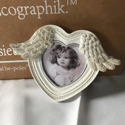 Storia dell&prime;amore doppio cuore ceramico cornice fotografica