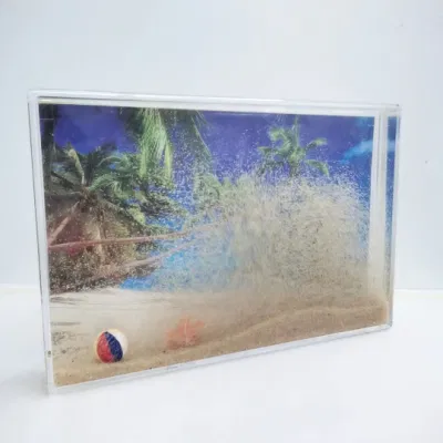 Cornice fotografica a liquido con sabbia e galleggianti