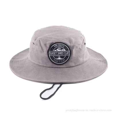 Sombrero de lona para playa al aire libre con ala ancha y estilo desenfadado.