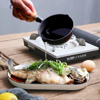 Olio vegetale rivestimento all&prime;ingrosso Vendita a caldo piccolo manico in legno fuso Mini padella in ferro
