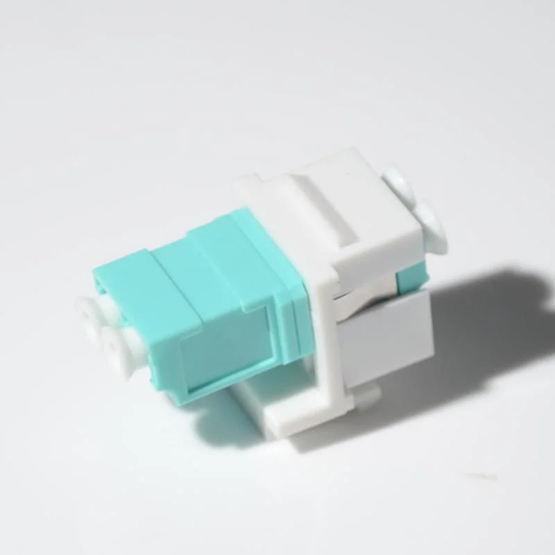 High Quality LC Sc Snap Fitting Duplex Fiber Optic Keystone Jacket Adapter