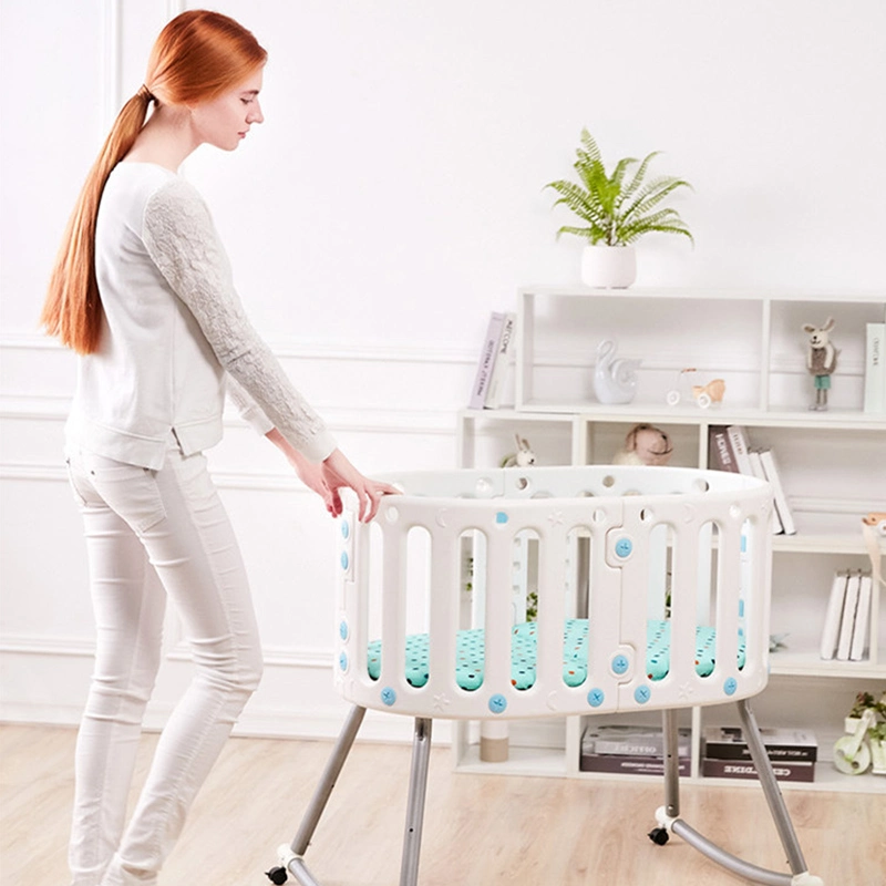 Multifunctional Baby Oval Crib for Newborn Baby Convitible to a Desk