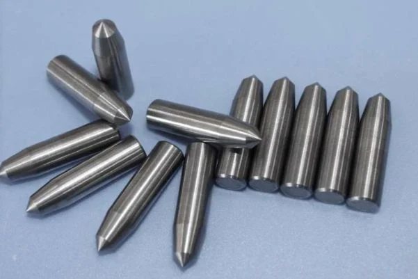 Non-Magnetic Superhard Tungsten Carbide Core for Lower Die