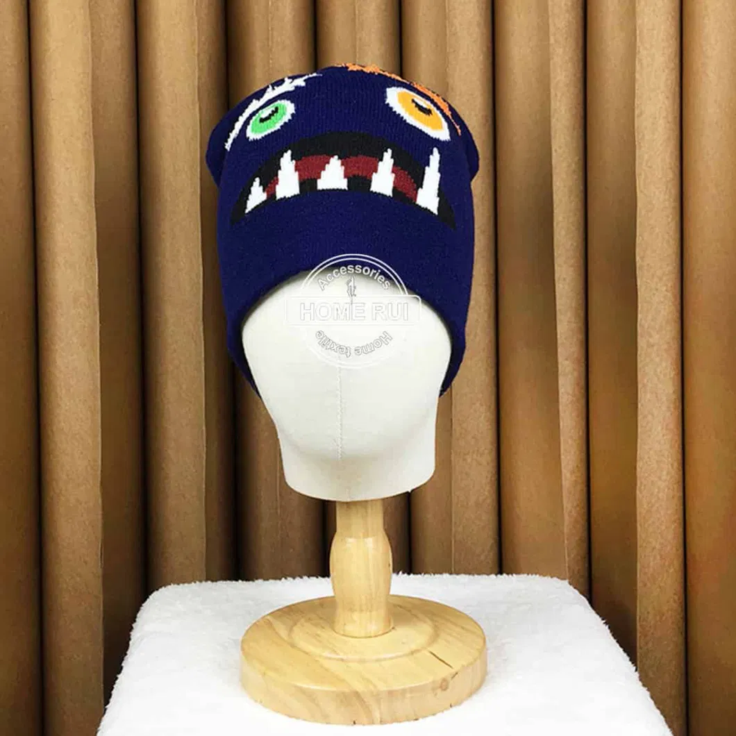 Designer Low MOQ Hats Custom Logo Knitted Monster Face Eyes Feather Eyebow Teeth Jacquard Skully Kids Cartoon Winter Cap Beanie