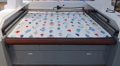 Sublimated Team Wear Textile Tent Laser Cutting Machine Auto Feeding Laser Cutter Cut Fabric Flowers.