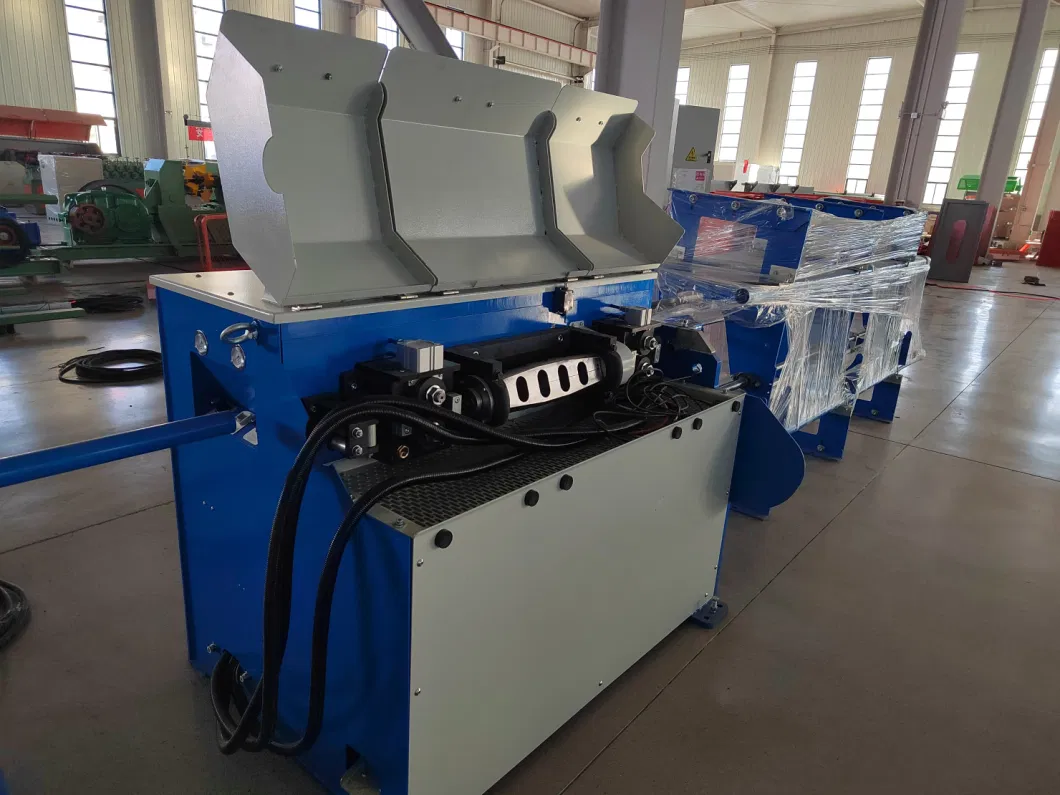 Reinforcing Bar Straightening and Cutting Machine