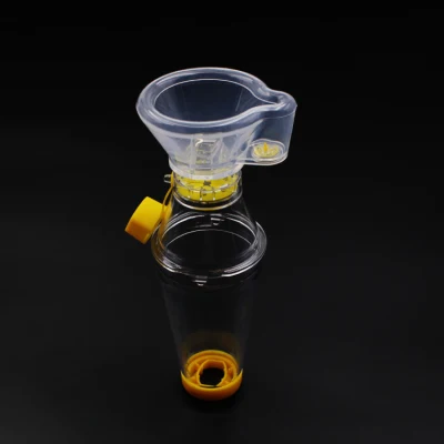 Cámara de aerosol inhalador espaciador para adultos y pediátricos con boquilla.