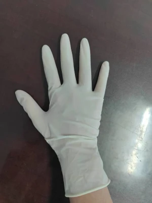 China Mayoreo médico desechable examen de seguridad Guantes sin polvo látex Guantes quirúrgicos de goma para manos