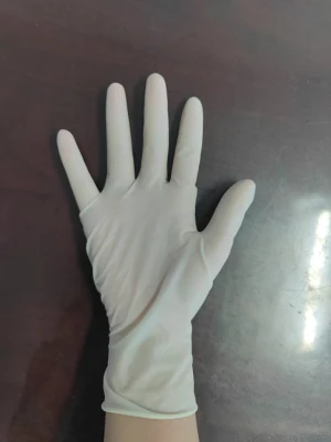 China Mayoreo médico desechable examen de seguridad Guantes sin polvo látex Guantes quirúrgicos de goma para manos