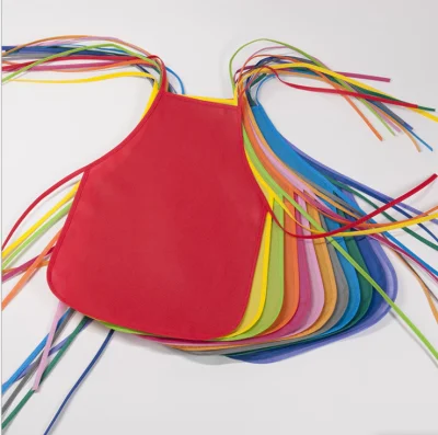 Venta caliente Non-Woven Amzaon impermeables desechables niños delantal de dibujo