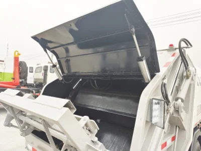 China Factory Jmc 6m3 Garbage Compactor Truck Waste Bins Compactor Truck Price