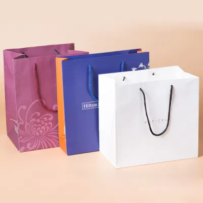 China Wholesale Custom Printed Logo Fashion Kraft Paper Packing Bags Shopping Gift Packaging Tote Bag for Handbags Cosmetic Shopping Bags