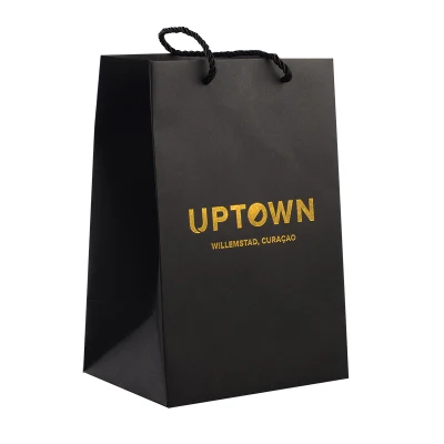 Bolsas de papel para compras personalizadas con asa de cinta de papel negro y lazo, con papel de tarjeta dorada para ropa interior, prendas de vestir, zapatos y ropa.