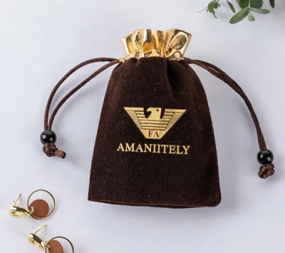 Bolsa de joyas de terciopelo azul con cordón ajustable de ante con logotipo plateado Bolsa de regalo