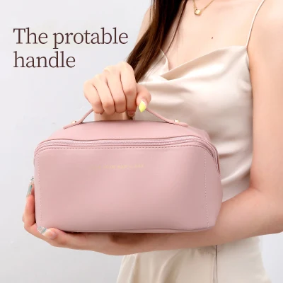 Bolsa de maquillaje pequeña y de color personalizada PU Travel Bolsa de cosméticos portátil Bolsa cosmética resistente al agua