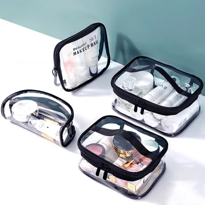 Mayorista OEM barato portátil transparente de PVC Maquillaje Bolsa Zipper impermeable Caja de embalaje de plástico transparente funda de almacenamiento de viaje Bolsa de aseo cosmético Con asa