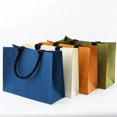  Logo personalizzato OEM marrone DuPont Tyvek Kraft lavabile e impermeabile Borsa per la spesa con manico in carta per il mercato cosmetico