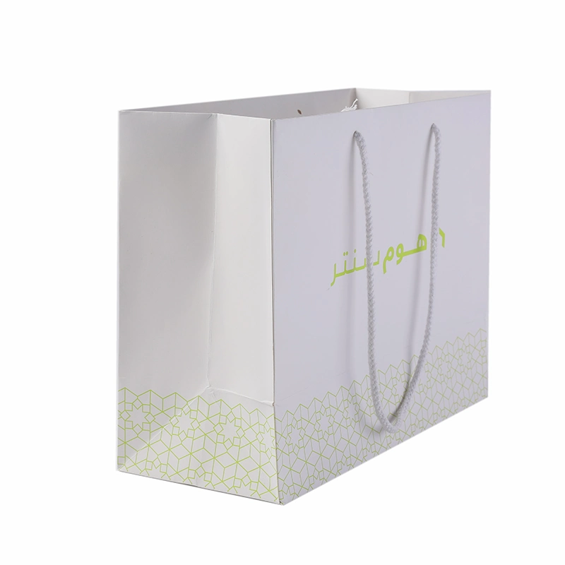 Wholesale Kraft Paper Shopping Garments Apparel Cosmetic Perfume Bag Luxury Handle Custom Logo Printed Paper Bag for Clothes