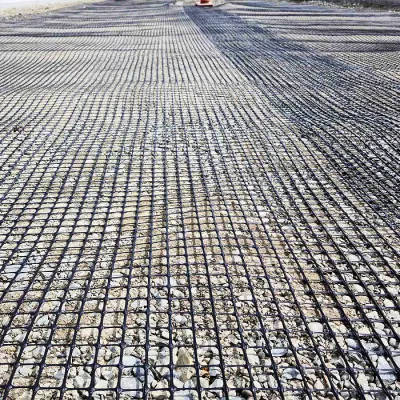 Material de construcción de carreteras PP plástico compuesto Geogrid Biaxial