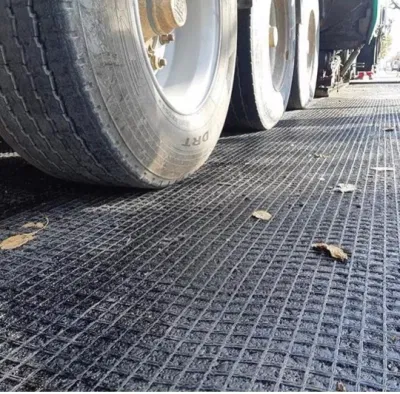 Compuesto Geogrid de poliéster recubierto de PVC de alta resistencia con PP Pet Geocompuesto geotextil no tejido