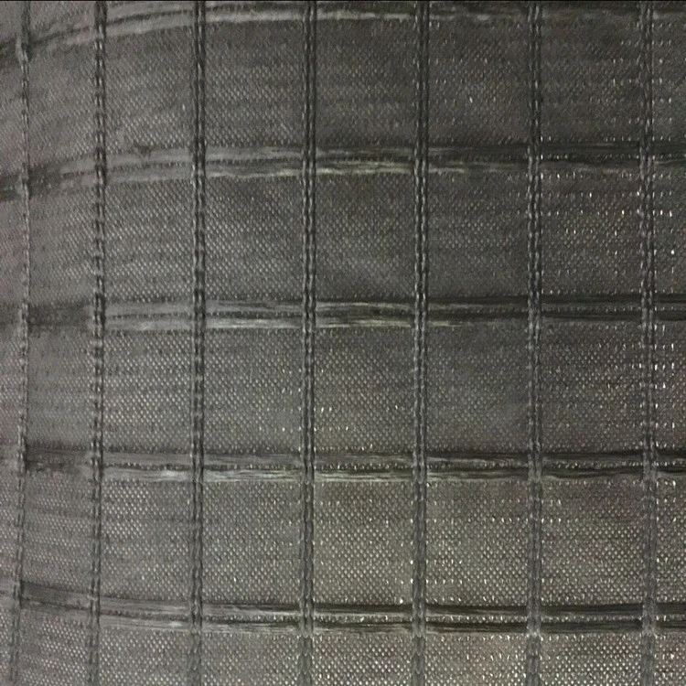 Fiberglass Geogrid Stitched with Nonwoven Geotextile to Reduce Reflective Cracking
