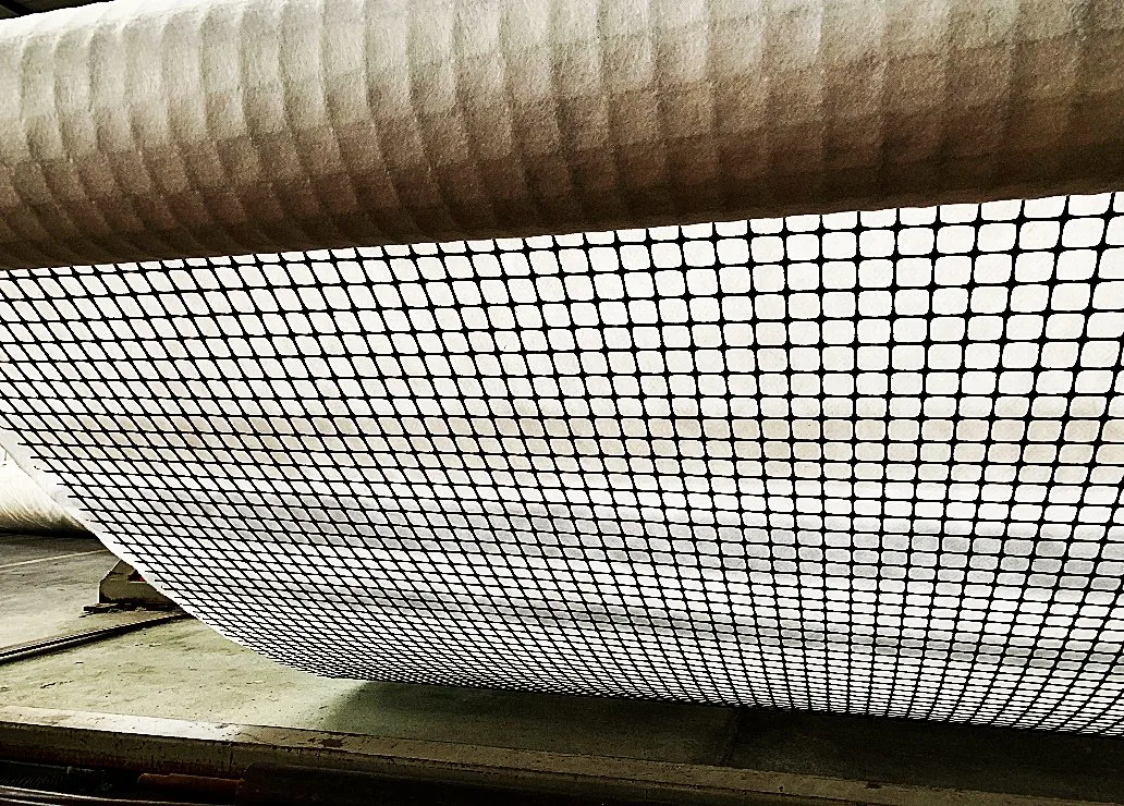Extruded PP Biaxial Geogrid Heated Bonded to a Pet Long Fiber Nonwoven Geotextile Pet PP Short Fiber Nonwoven Geotextile