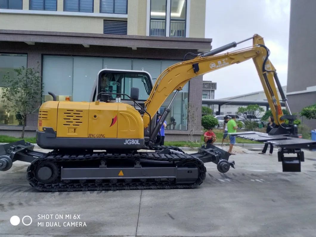 Hi-Rail Excavator with Bearer Grab Attachment Transports and Replacing Sleepers Railroad Machine