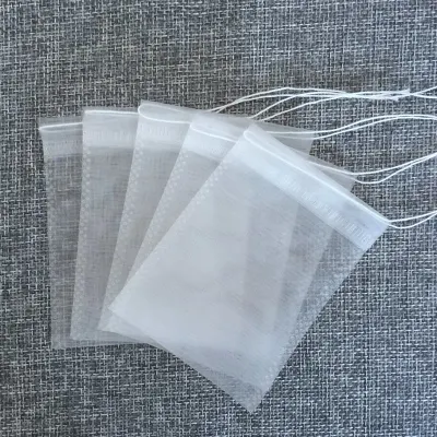 Sacchetto da tè in piramide di nylon da 6*8cm biodegradabile con stringa di traino Nylon tè vuoto Borsa