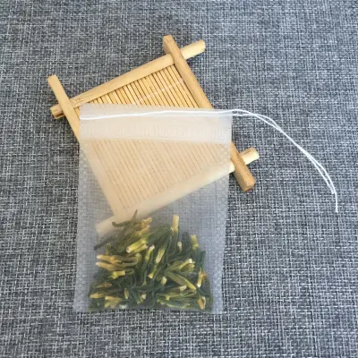 Sacchetto da tè in piramide di nylon da 6*8cm biodegradabile con stringa di traino Nylon tè vuoto Borsa