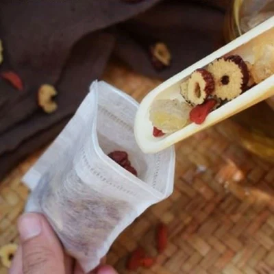 Confezione di sacchetti per tè in fibra di mais biodegradabile con etichetta di carta a corda