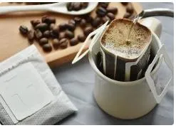 Macchina per l&prime;imballaggio di sacchetti DIP per caffè arabica robusta