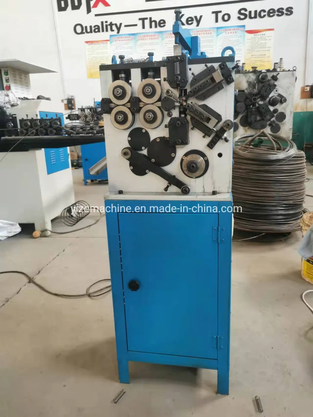 Automatic CNC Camless Wire Coiling Machine 3 Xis Hot Coil Car Garage Door Shutter Coil Spring Machine Price