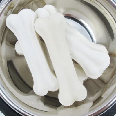  Calcio elevato per la macinazione dei denti schiuma Cow Skin ossa pressate Pollo pelle mucca Garland prodotto animale domestico Chew Ball Treat cibo Snack