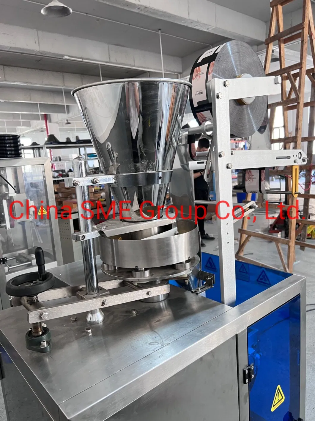 Loose Rounded Granules in The Pharmaceutical, Food, Chemical, and Other Industries. Such as Puffed Granules, Peanuts, Melon Seeds, Rice, Seeds, Pack Machine