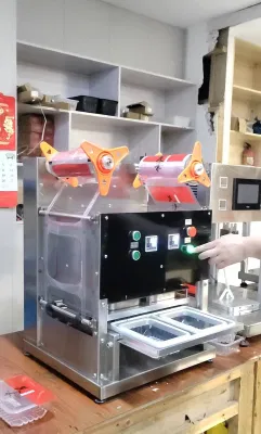 Caja de embalaje desechables máquina de sellado dos Fiambreras en un momento