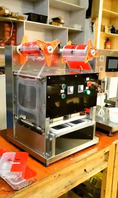 Caja de embalaje desechables máquina de sellado dos Fiambreras en un momento