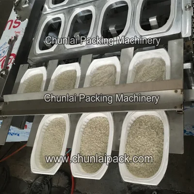 Envasado de alimentos comidas preparadas Autocalentamiento de bandejas de arroz sellado y llenado Máquina